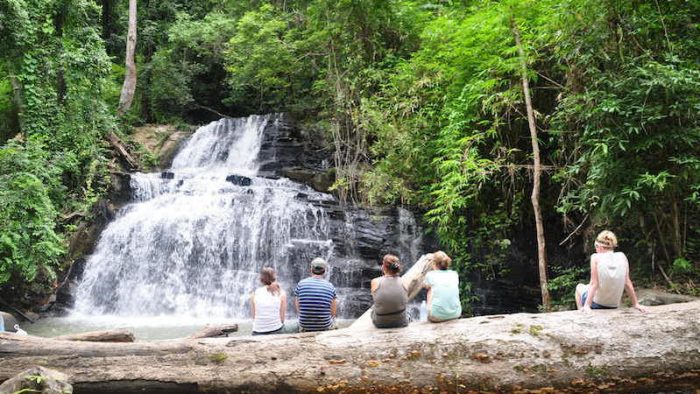 guests at the waterfall Karen Jungle Trails