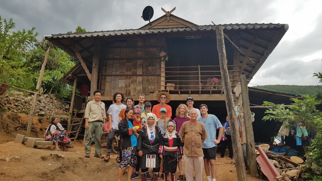 Tribal people with students