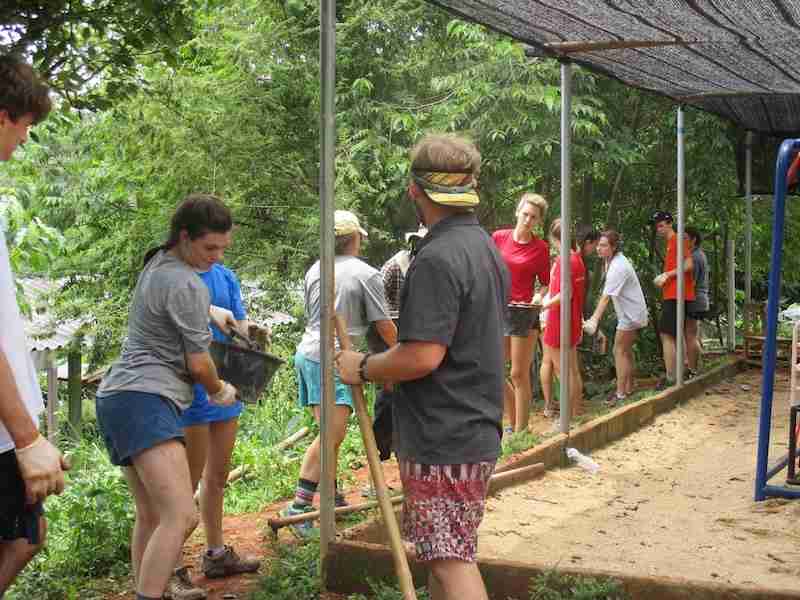 Students at work in a village